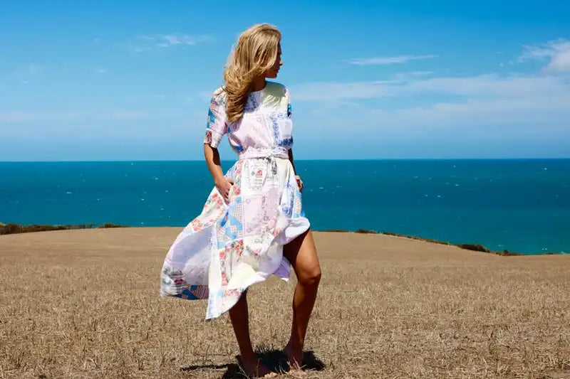 Floral print summer dress with a high-low hem and tie waist.